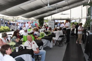 Campaign imagery showing crowds learning about nuclear energy at a public engagement event